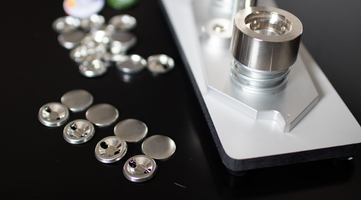 Button maker with button blanks