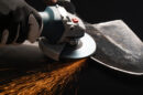 Person using an angle grinder