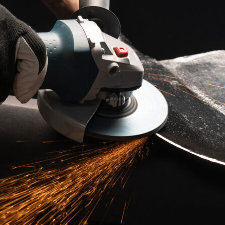 Person using an angle grinder