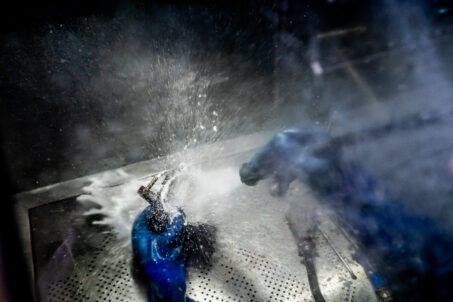 Person using a sandblaster