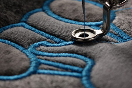 Close up of embroidery machine on fabric