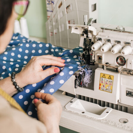 Person using a serging machine