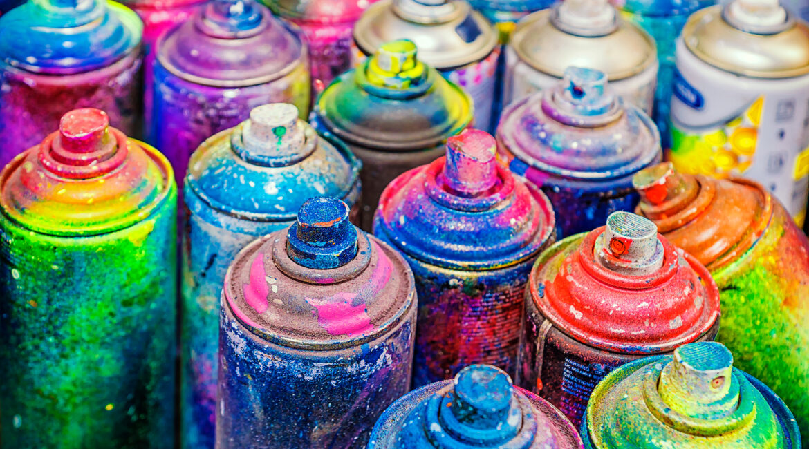 used cans of spray paint