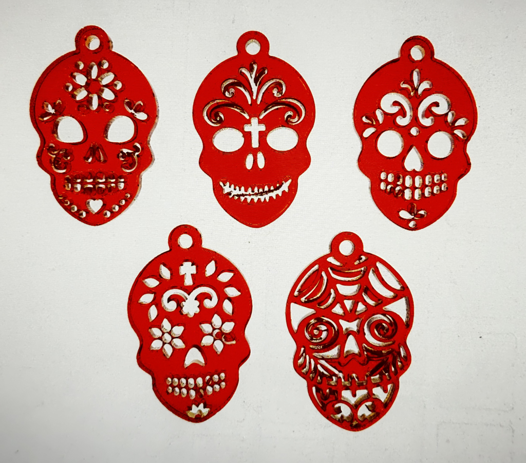 5 different laser cut Skull keychains