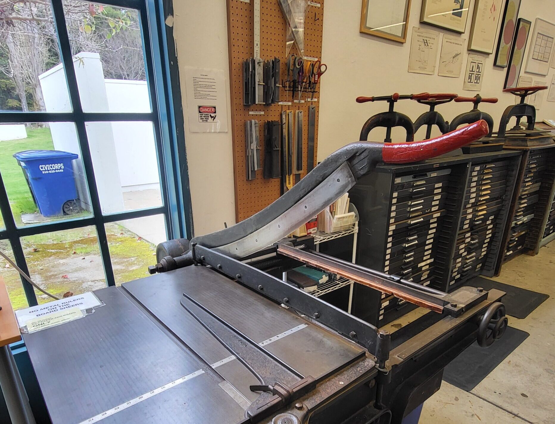 Board shear in the Analog Print Lab.