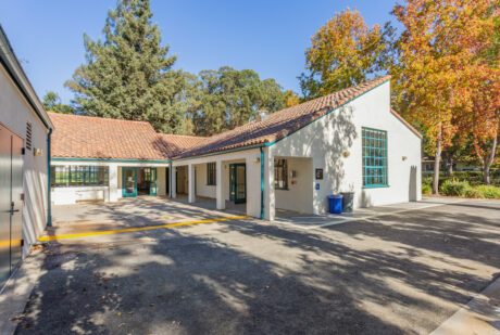 Photo of a building with trees in the background