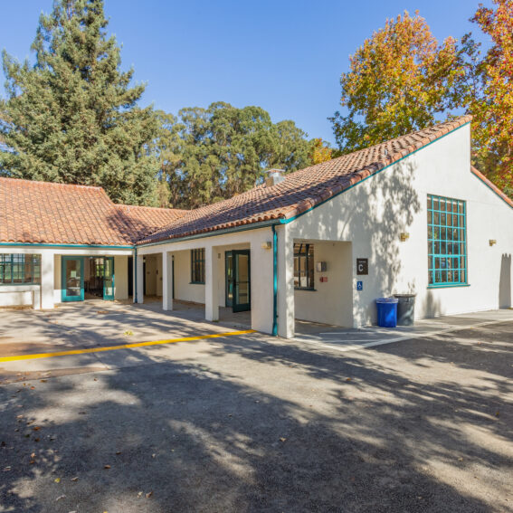 Photo of a building with trees in the background