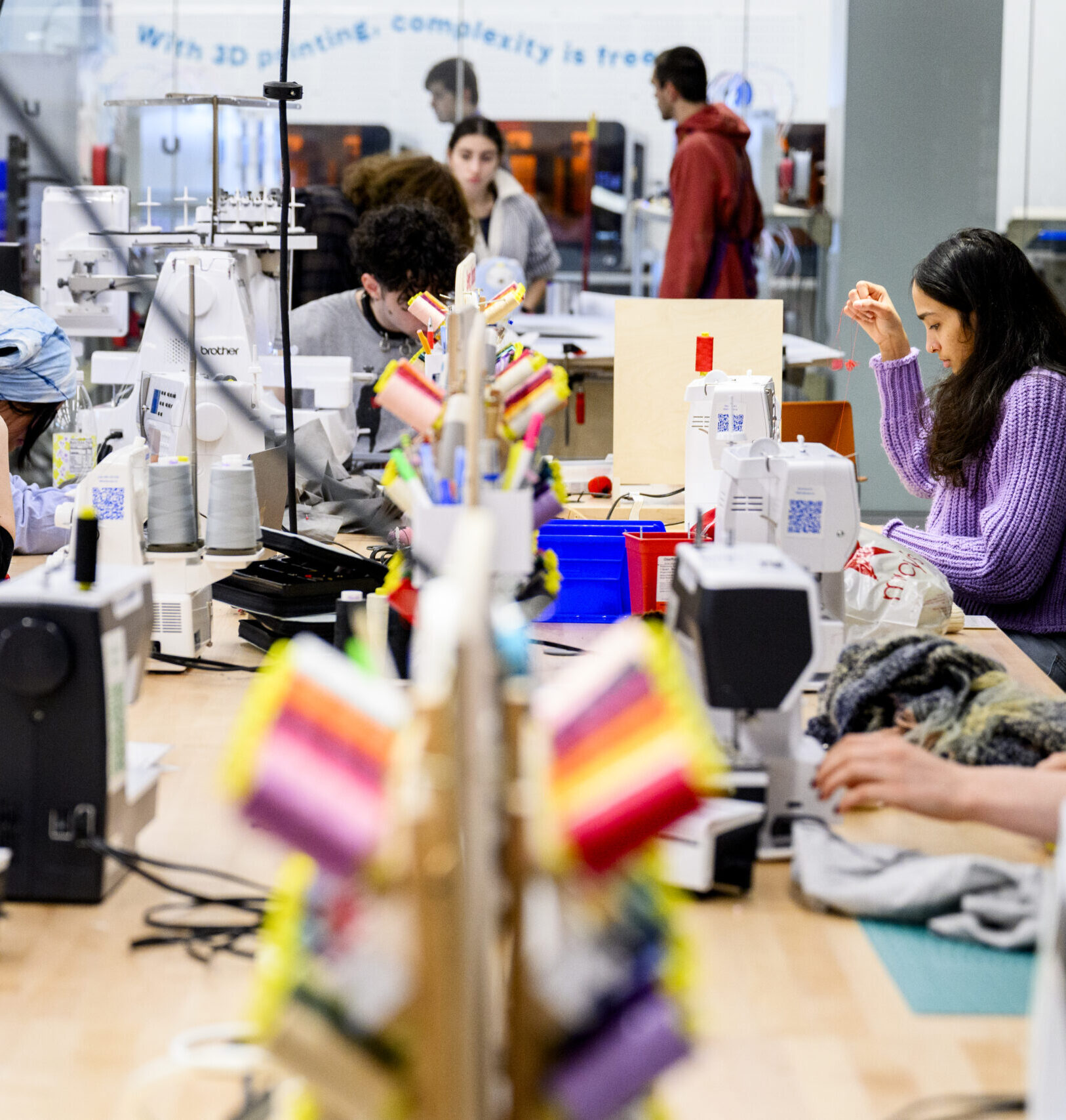 Students work on textiles.
