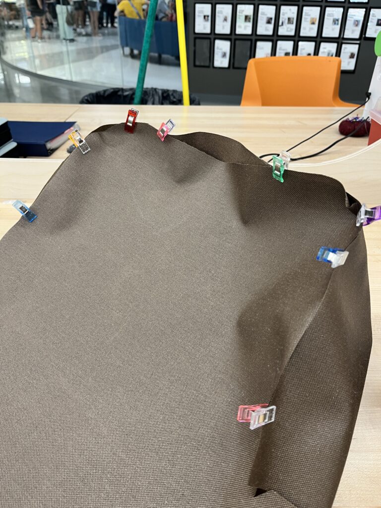 clips on brown fabric