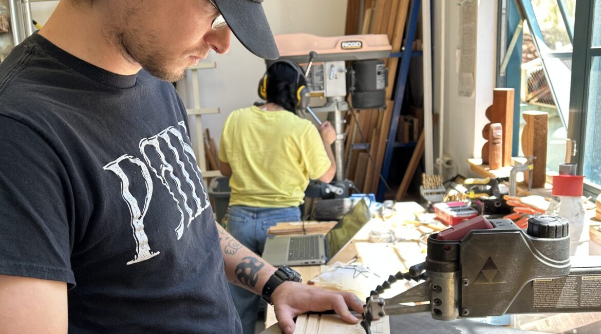 Person using a scroll saw