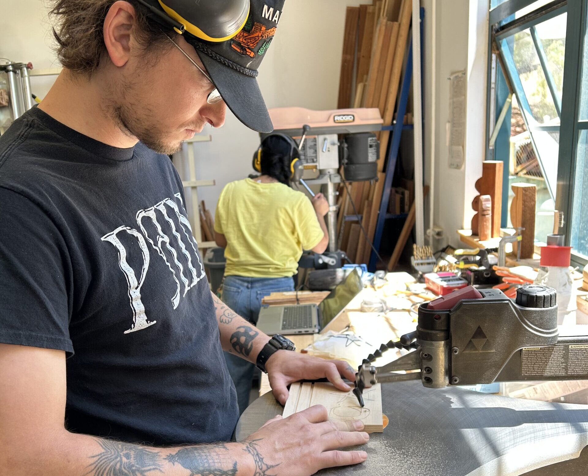 Image Person using a scroll saw