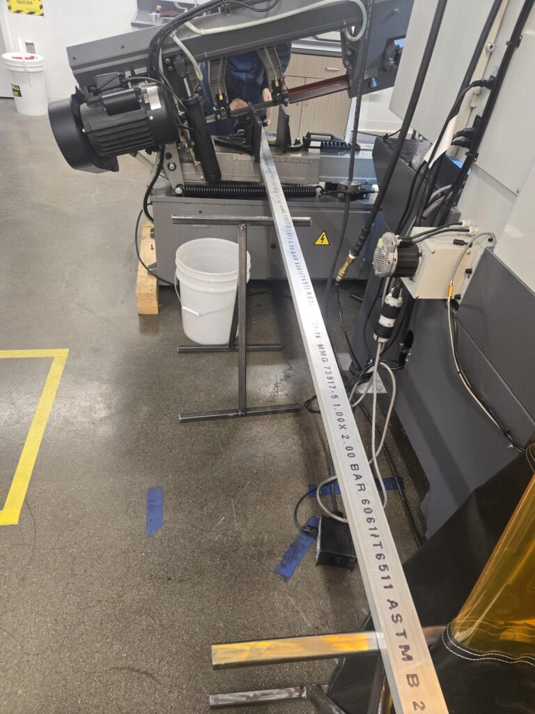 Horizontal stock on top of the outfeed tables.
